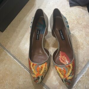 Stunning and rare embroidered D’orsay heels.